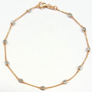 Bracciale in oro rosa con sfere bianche