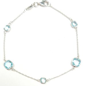 Bracciale in oro bianco con topazi azzurri